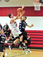 Home at last, Hawks flatten Tigers