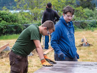 Students build huts for WAGAP
