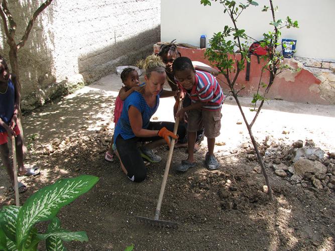 Heads held high in Haiti: Charla Banks returns to troubled Caribbean nation on teaching, volunteering mission