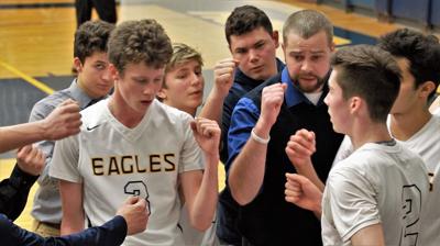 A7 HRV Boys Basketball coach dirks and players.jpg