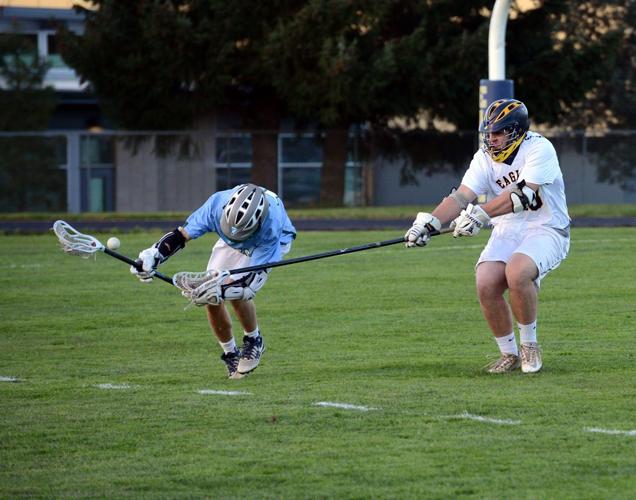 Boys lacrosse team stands tall in loss to formidable OES