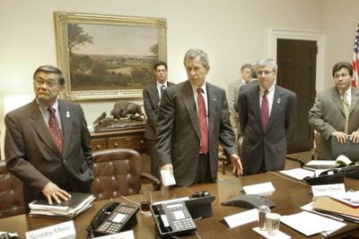 On Sept. 17, 2001, Transportation Secretary Norman Mineta, left, met with President George W. Bush and others.