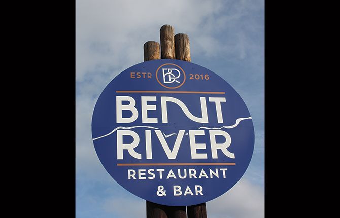 Fine dining near a bend in the river
