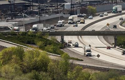 Man dies in overpass jump