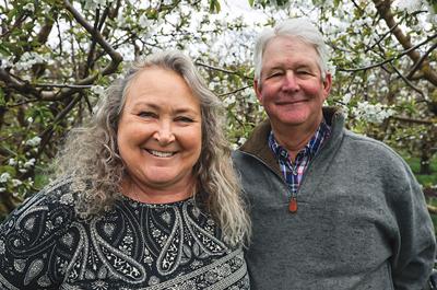 Liz and Ken Polehn were recently pictured in their orchards. Contributed photo