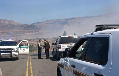 Fire threatens Pinewood, now contained
