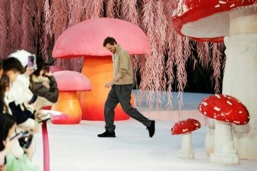 Matthieu Blazy emerges to acknowledge the audience