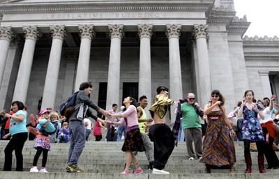 Dozens shimmy, shake to protest Washington’s dance tax