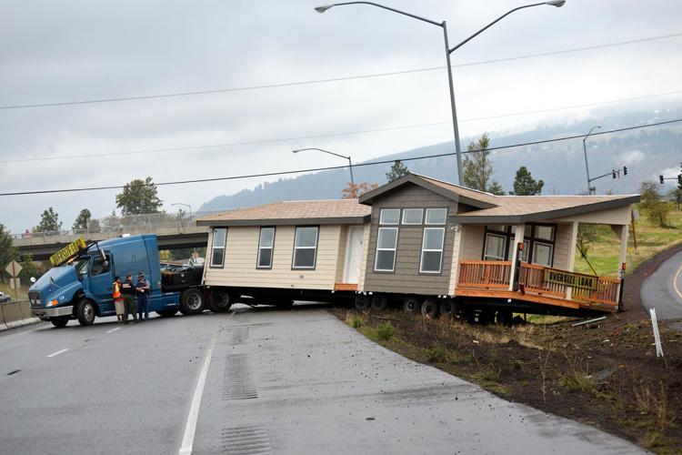 Truck hauling mobile home crashes in Hood River