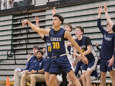 Senior Talon-Quinn Britt shoots a three last season   Noah Noteboom photo