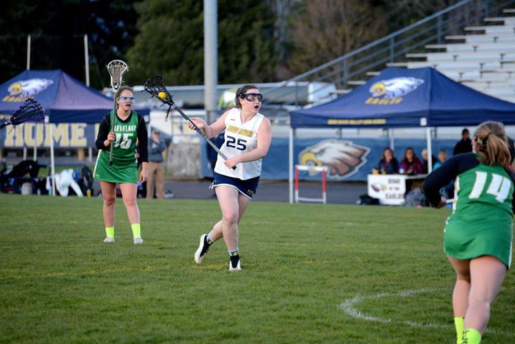 Girls lax rolls Cleveland, 13-2, in home debut