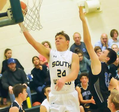 SWC boys split two league games