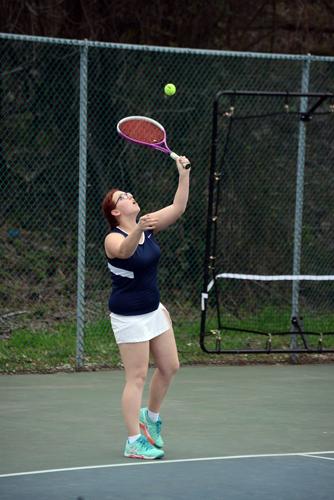 Back from break, tennis teams torch competition