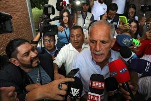 Honduras presidential candidate Nasry Asfura of the right-wing National Party arrives to cast his vote in Tegucigalpa