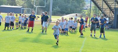 Youth football snaps into action