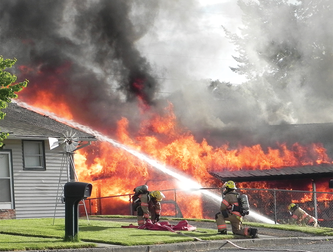 Fire guts home on E. 16th Court