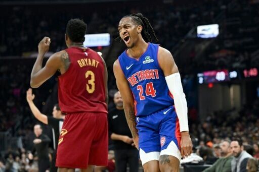 Detroit's Daniss Jenkins celebrates a three-point basket in the Pistons' NBA win over the Cleveland Cavaliers