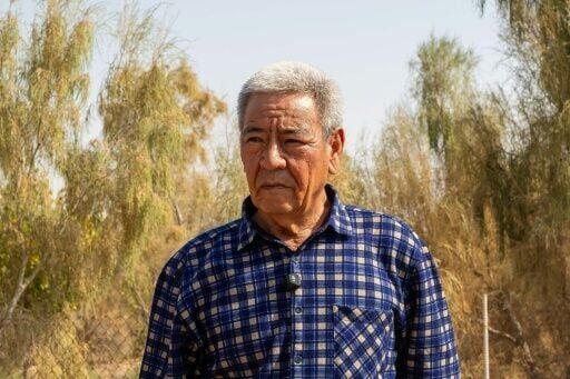 Rolling desert sands have forced residents to shift further downhill