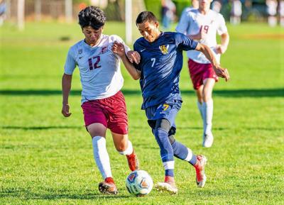 Boys soccer wins home opener