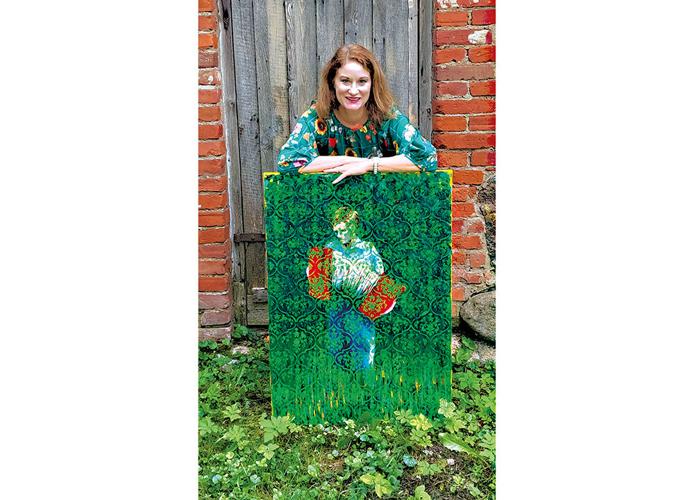 Joy Kloman shows off her work during her artist residency in Latvia. Photo courtesy of Joy.