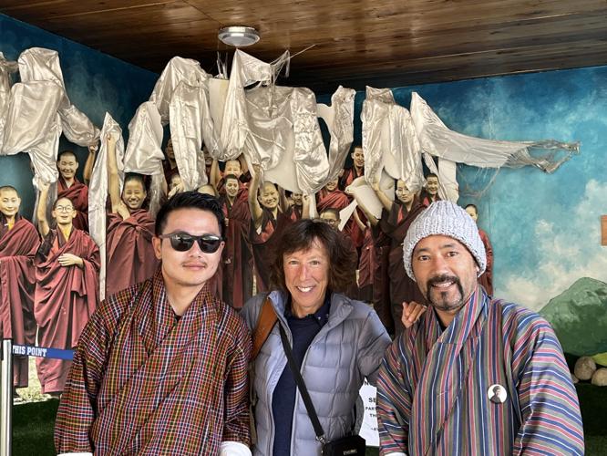 Spring, Jill Burnette, and driver, Phuba. Spring lives by Buddhist principles, he said, but is not religious.