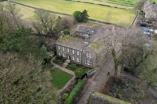 The parsonage where the Brontes lived stands between the village of Haworth and the moors