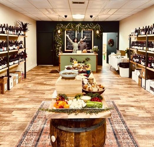 Dave and his wife ready to welcome guests for their Grand Opening, complete with wine selections and fine grazing tables. Photo courtesy of Dave Nagengast.