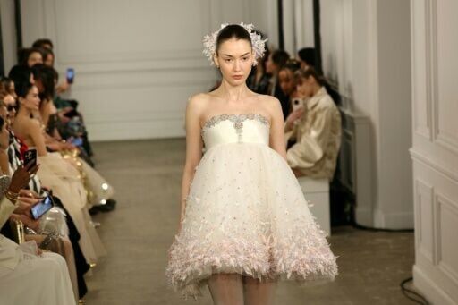 Designer Phan Huy's light muslin and tulle fabric dazzled a celebrity audience in Paris