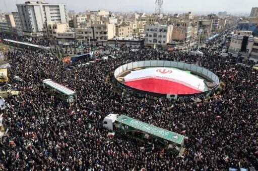 Iranians attend the funerals of fighters killed in the war, in Tehran on March 11, 2026