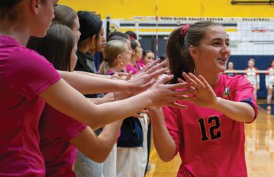 Lyla Mall (12) high fives fans before a game earlier this year       Nate Wilson photo