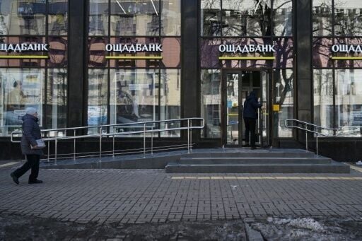Oschadbank said staff were transporting the cash and gold in a 'routine trip'