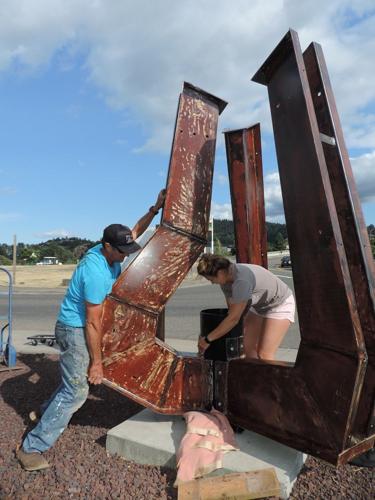 A2 big art, river trident, macrae wylde, installing July 2 at Riverside and Second, with help from his daughter, Fiona.JPG