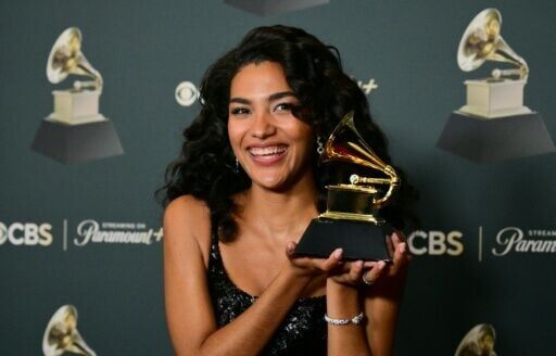 British singer-songwriter Olivia Dean poses with her Grammy for Best New Artist