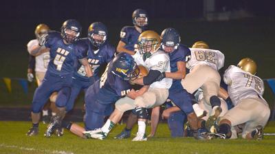 Outsized, but feisty Eagle football squad falls to Pendleton