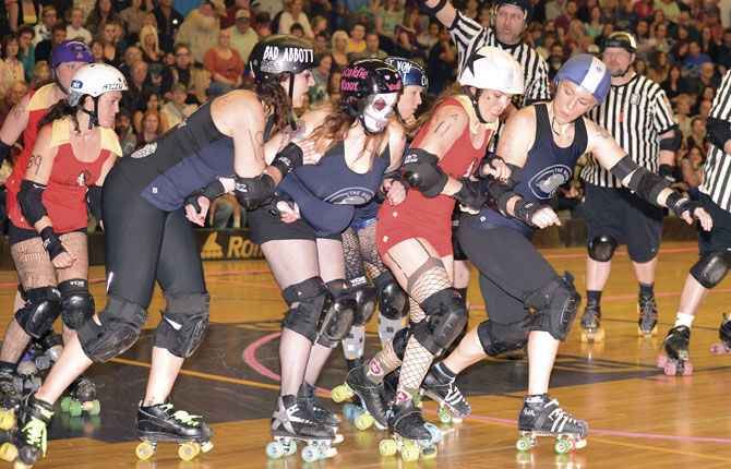 Derby dynamos: Gorge Rollergirls hit the hardwood at Hood River Valley High