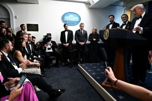 US President Donald Trump (R) speaks during a press briefing in the Brady Briefing Room at the White House in Washington, DC, shortly after a shooting incident at the White House Correspondents’ Dinner