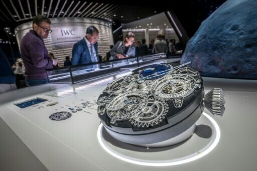 The IWC stand features a replica timepiece depicting its movement mechanisms