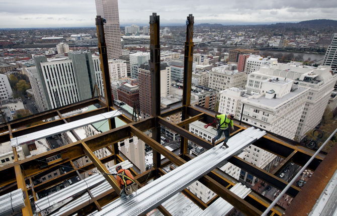 Iron workers brave perils on tower