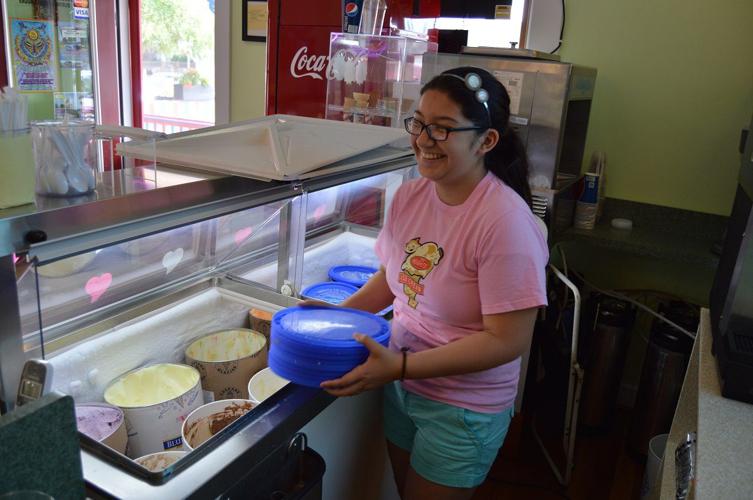 Genesis Quezada, 16, takes summer one scoop at a time