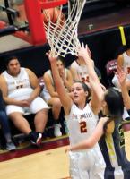 TD boys, girls defeat St. Helens