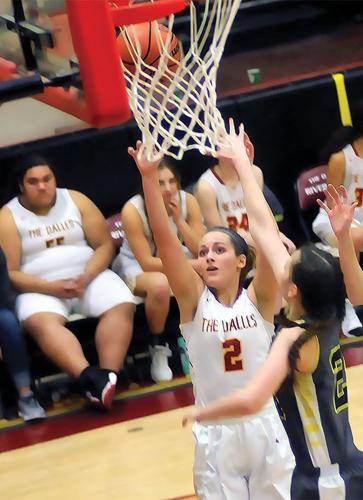 TD boys, girls defeat St. Helens