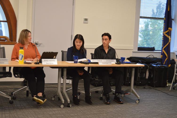 09-21 HR MUST RUN Board meeting main Student envoys Giselle and John (1).JPG