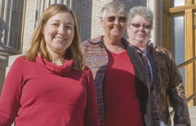 Jury awards $2.4M to trio