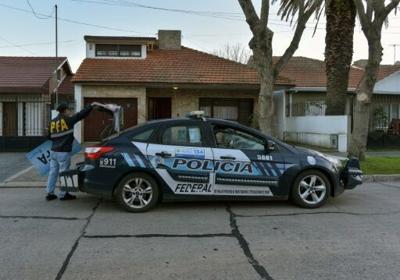 Argentine Federal Police raid this house in Mar del Plata after a property ad allegedly revealed the presence of a 17th century masterwork stolen by the Nazis from a Dutch Jewish art collector