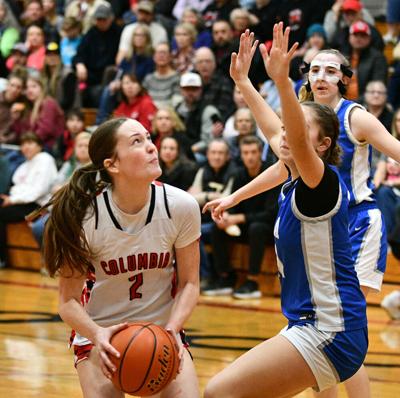 Halle Koch (2) attacks the basket against Elma on Feb. 13.