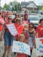‘Red For Ed’ march and rally draws 300