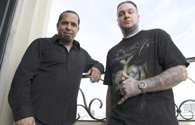 Hanks father and son make their marks in ink