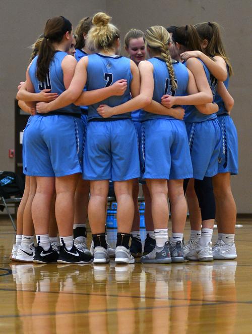 St Dominic Catholic Girl S Basketball Team Huddles Together