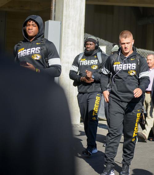 From left, Missouri defensive lineman Isaiah McGuire, quarterback Taylor Powell and defensive lineman Franklin Agbasimere head to the locker room