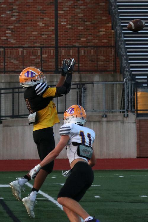 Hickman defensive back Jaiden Tandy goes up for an interception